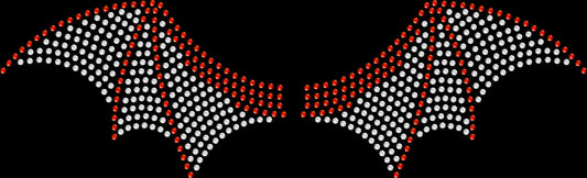 Sparkling rhinestone bat wings positioned across the back of a shirt, creating a dramatic press-on-back Halloween design for spooky season, gothic outfits and Halloween events.