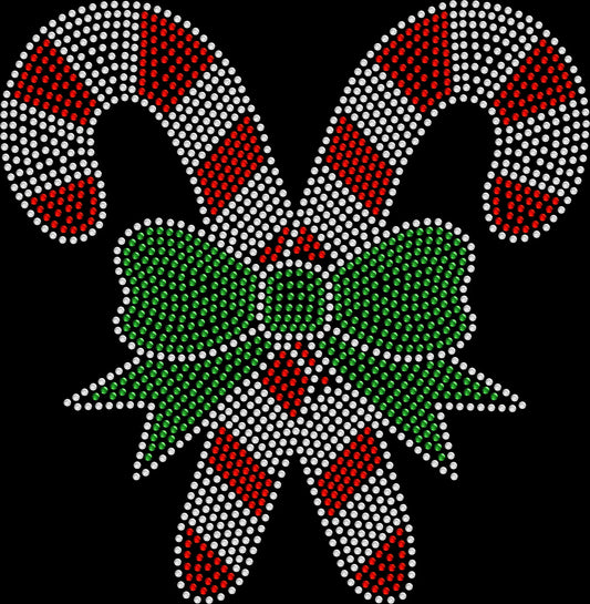 Crossed Christmas candy canes rhinestone shirt featuring sparkling crystal candy cane designs on a soft women’s tee, perfect for holiday parties, festive wear, and Christmas celebrations.