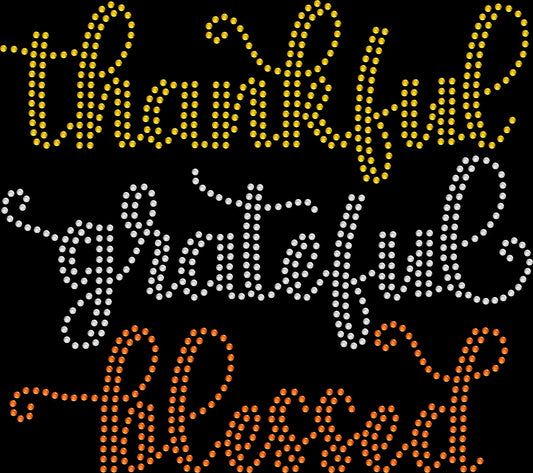 Thankful Grateful Blessed rhinestone shirt featuring elegant cursive lettering in sparkling crystal rhinestones on a soft women’s tee, perfect for fall, Thanksgiving, and faith-based gratitude outfits.