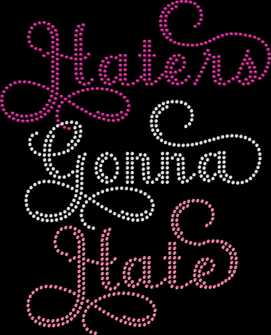 Cursive Haters Gonna Hate rhinestone shirt featuring sparkling crystal script lettering on a soft women’s fashion tee, expressing confidence, sass, and glam sparkle style