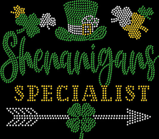 Sparkling rhinestone shirt that reads “Shenanigans Specialist” on a black t-shirt, funny St Patrick’s Day bling tee for women perfect for bar crawls and parties.