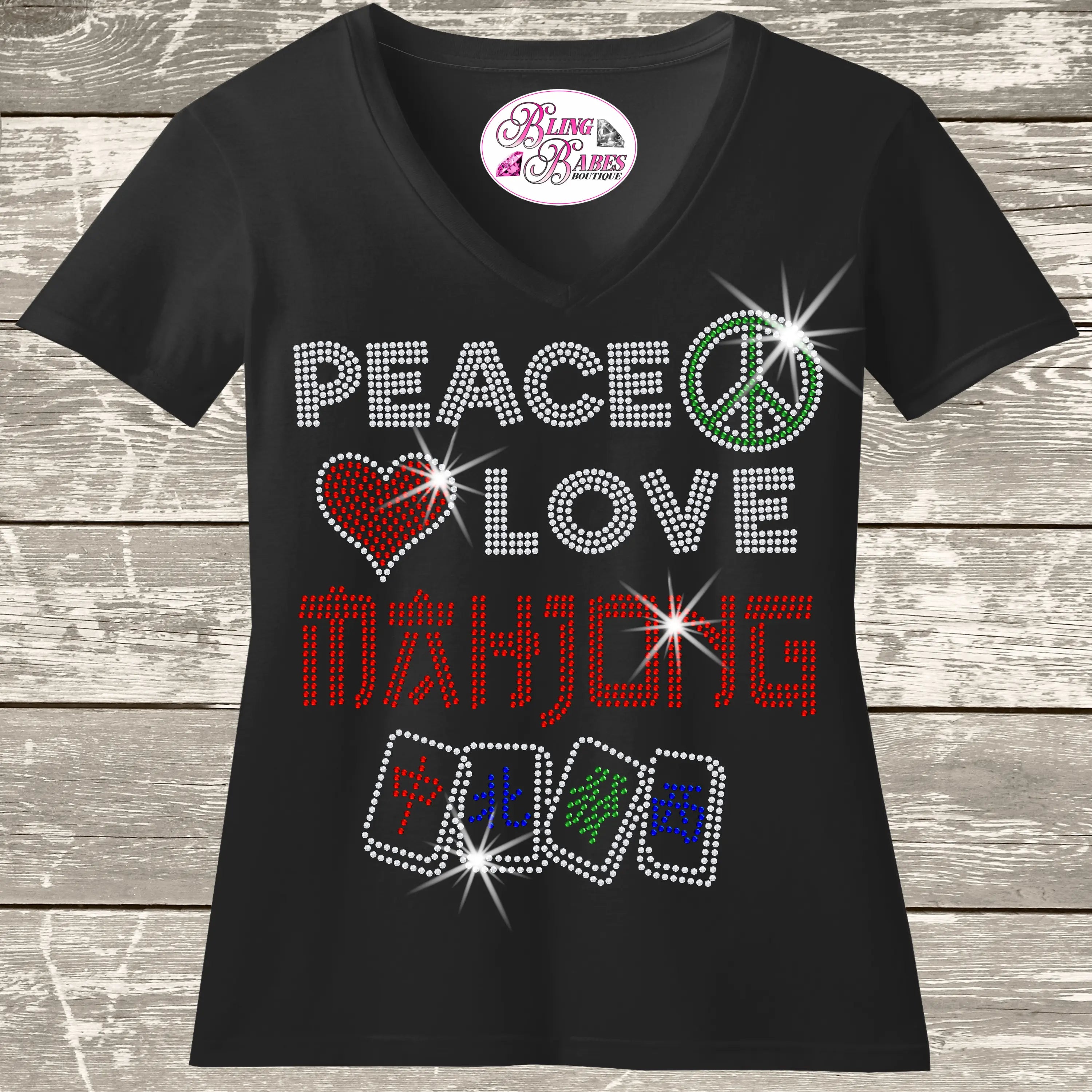 Peace Love Mahjong shirt featuring a sparkling Mahjong player design created with premium glass rhinestones or holographic spangles. Perfect for Mahjong game nights, clubs, tournaments, groups, girls' weekends, matching player outfits, parties, and gifts for women who love Mahjong. 🀄💖✨💎🎉