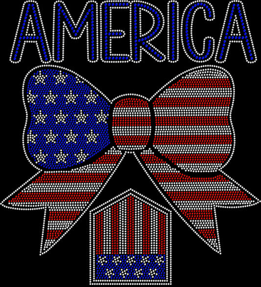 Sparkly rhinestone shirt featuring an American flag bow design in red white and blue bling on a soft cotton unisex t-shirt, perfect for 4th of July, summer parties, and patriotic celebrations.