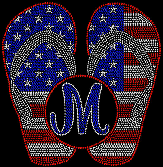 Sparkling rhinestone American flag flip flop monogram shirt with custom letter on a black t-shirt, patriotic bling tee for women.