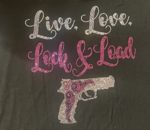 Live Love Lock and Load rhinestone shirt featuring sparkling crystal lettering on a soft women’s fashion tee, delivering bold statement style with glam sparkle